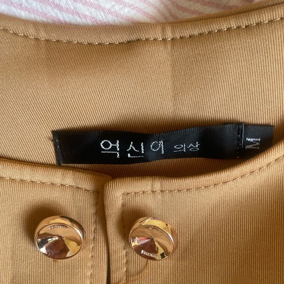 Cute tanned coat with bow on the back - Picture 2 of 5